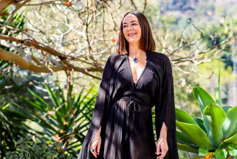 Chassie Bell Somatic Coach in black flowing dress cropped 768x516